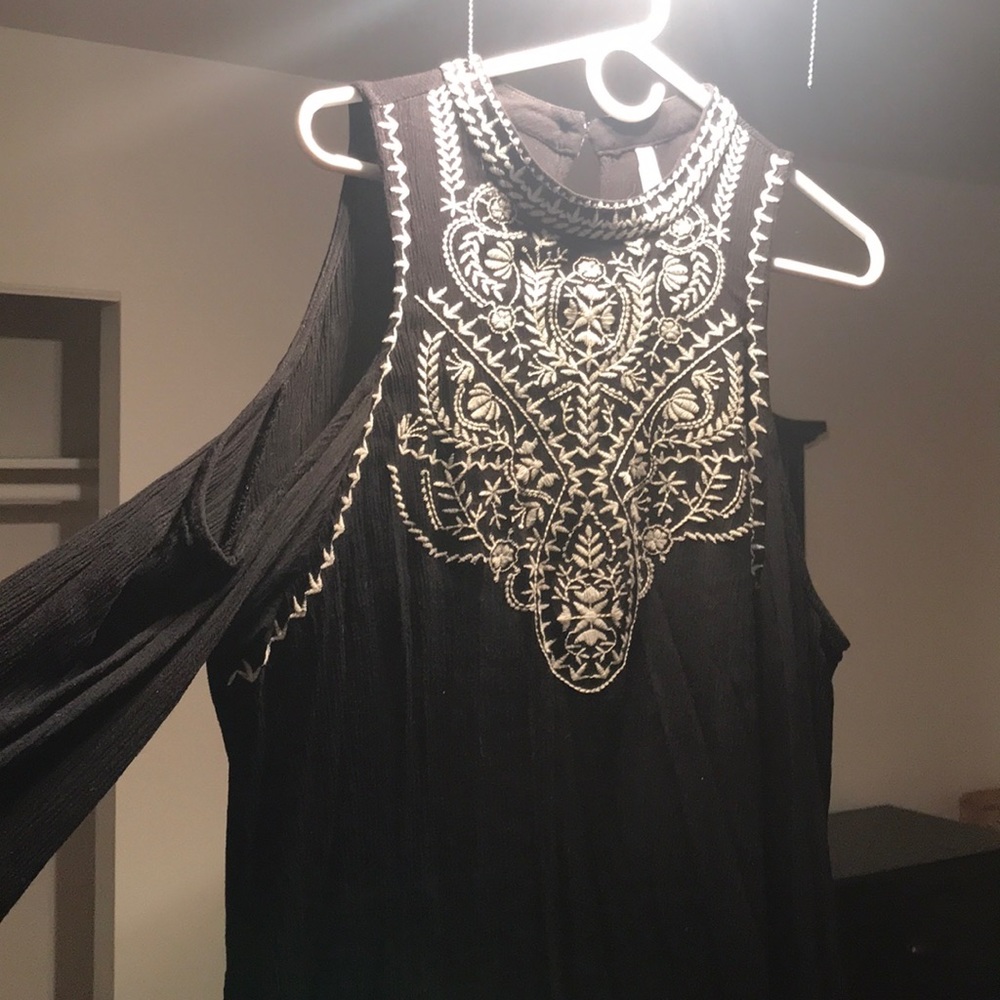 Long sleeved black top with high lace neck line